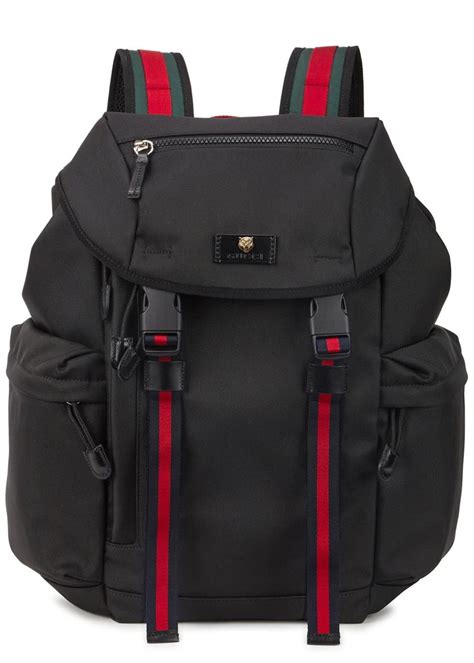 gucci backpack with gold symbol|Gucci black canvas backpack.